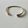Gouden bangle glad