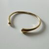 Gouden bangle glad