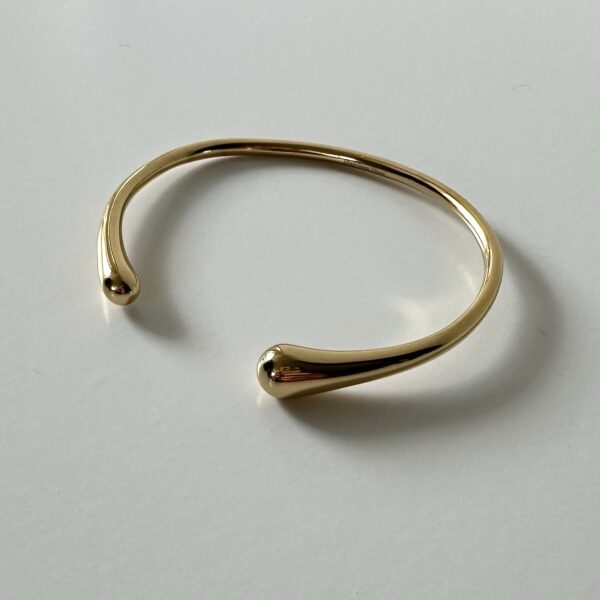Gouden bangle glad