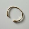 Gouden bangle glad