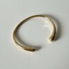 Gouden bangle glad